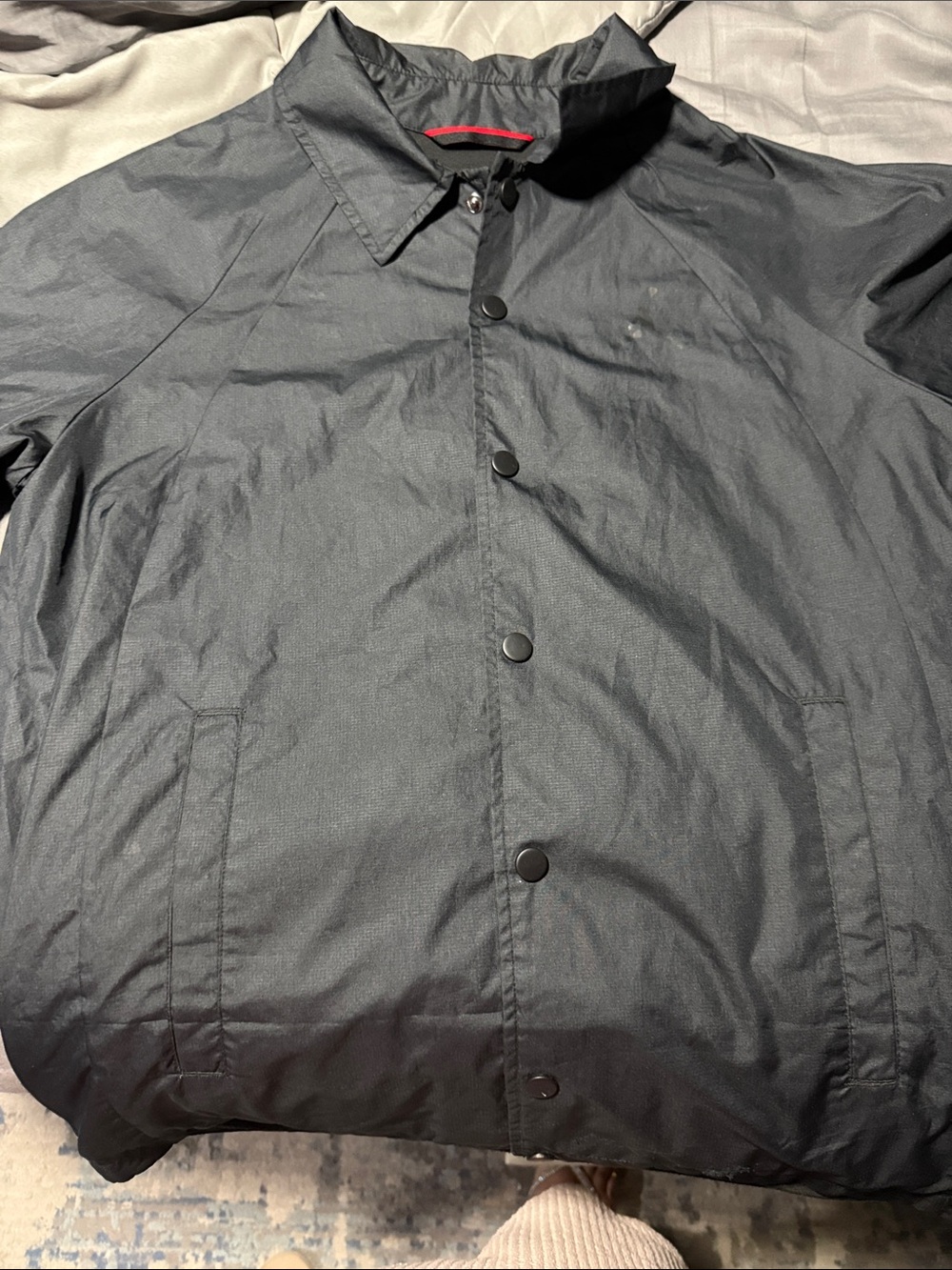 Jordan Men's Black Windbreaker Jacket with Subtle Red Trim